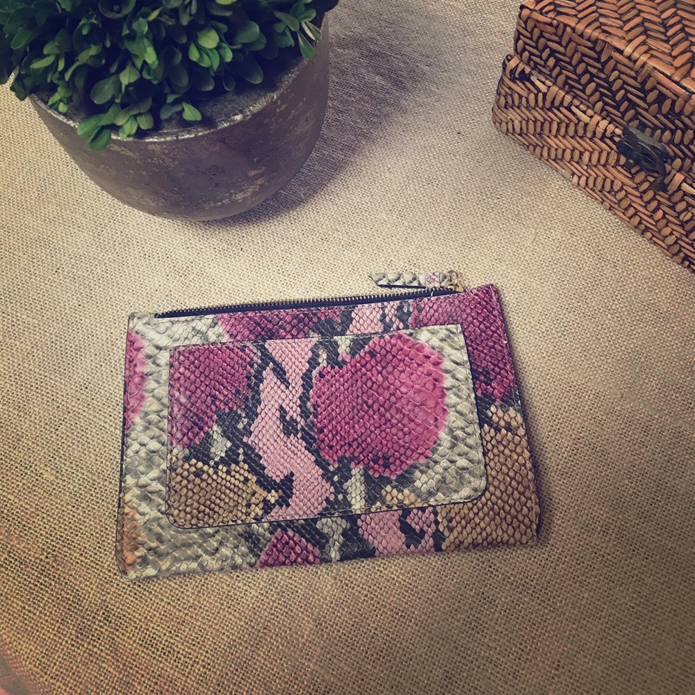 Snake-print clutch